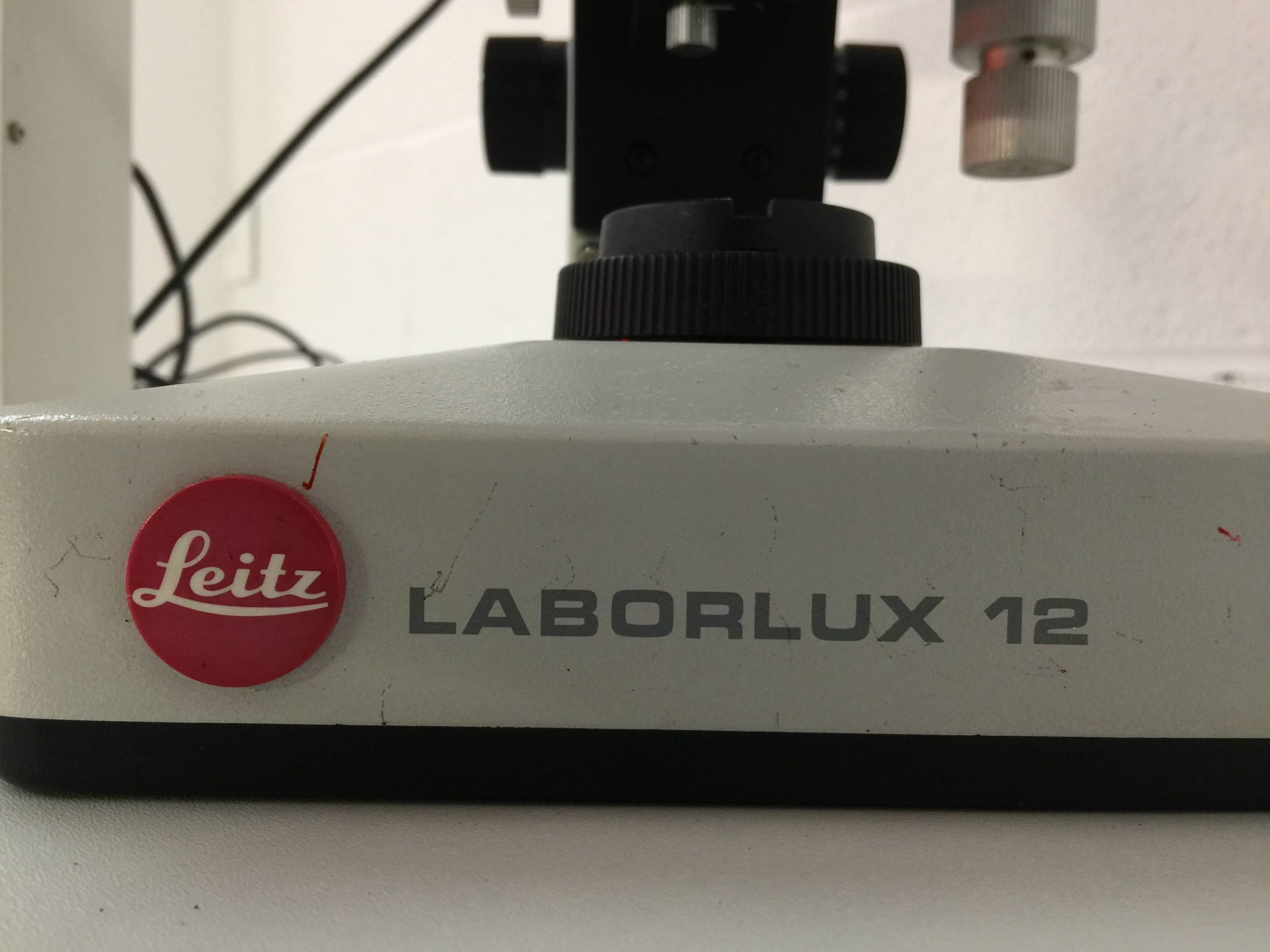 leitz laborlux 12 microscope with uv lightbox
