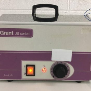 Grant JB1 Unstirred Water Bath from Grant JB Series. It is pictured turned on by a large glowing flip switch, temperature is adjusted by a dial that moves between 0 and 90 degrees Celsius