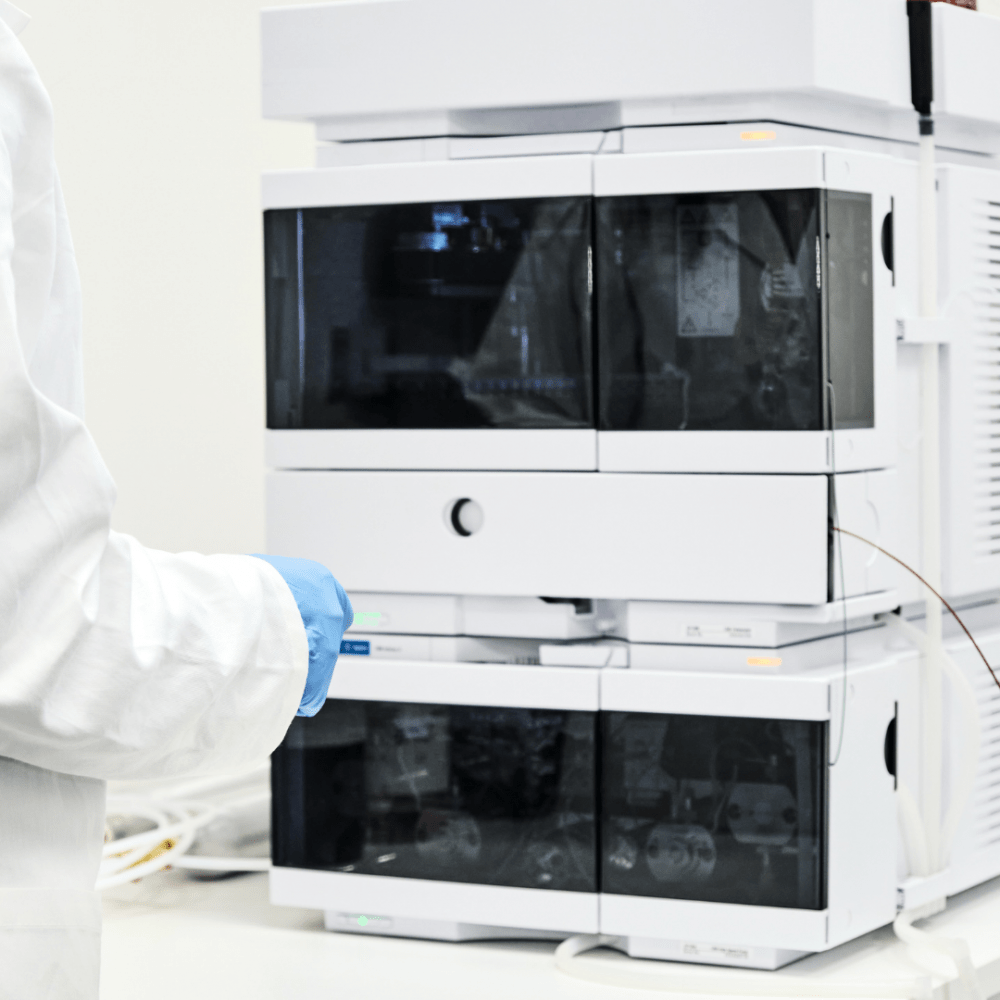 HPLC units, with a person working nearby