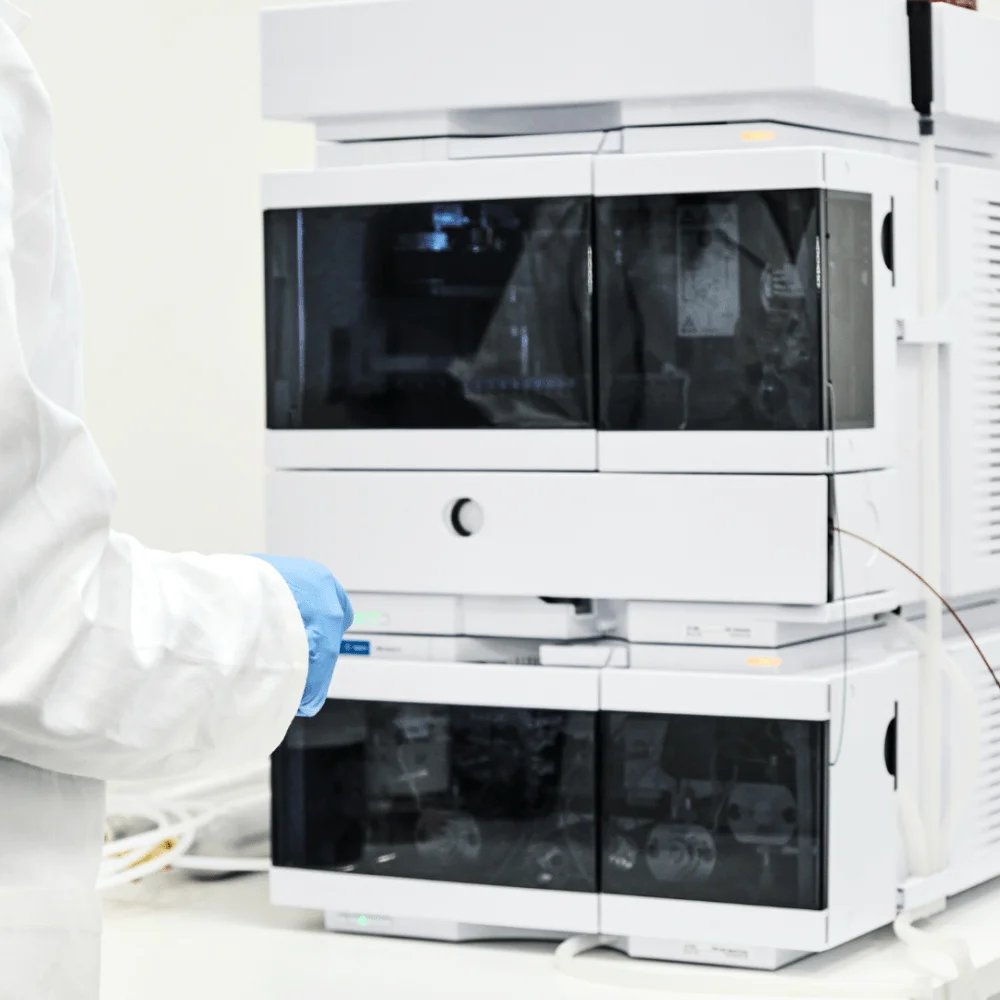 HPLC units, with a person working nearby