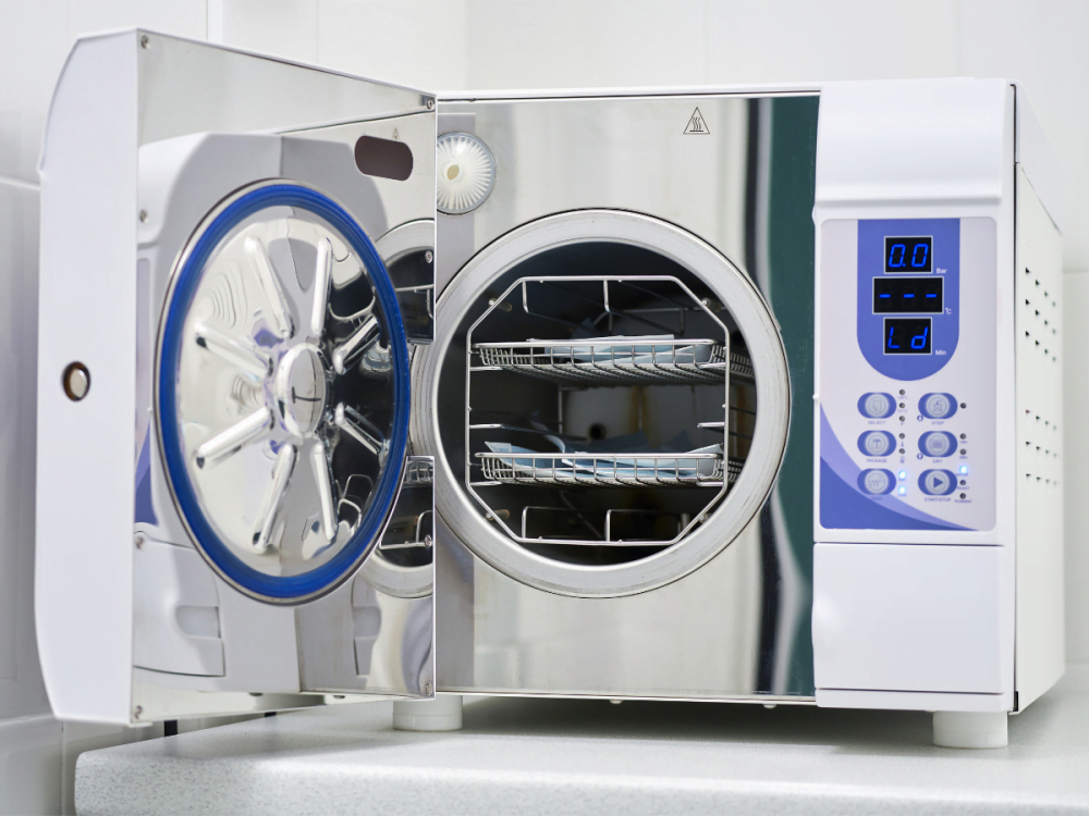 Open front loading autoclave machine