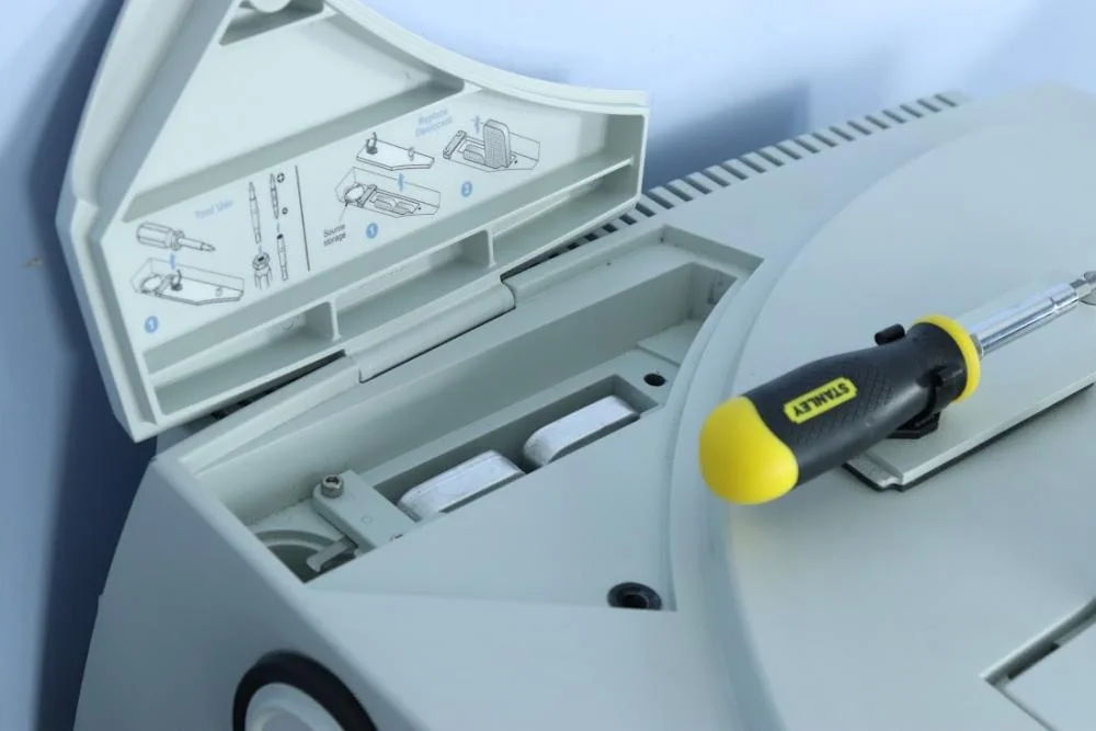 FT-IT back panel with desiccant trays and screwdriver