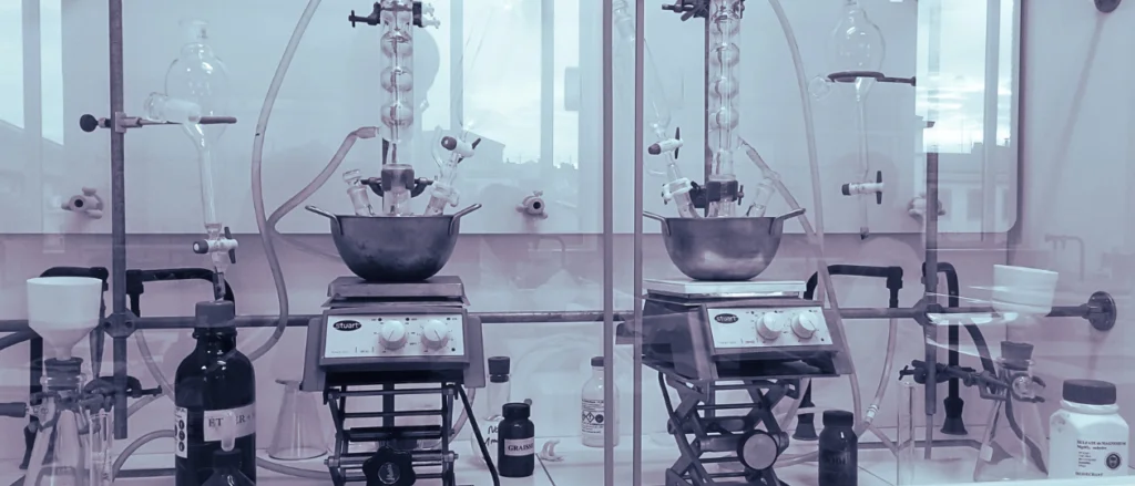 Stylised photograph of glassware in a fume cupboard